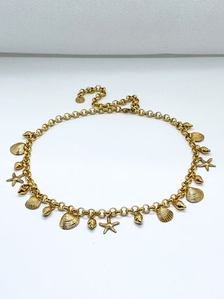 Collier breloques coquillages