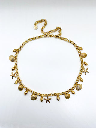 Collier breloques coquillages