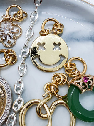Charm smiley doré